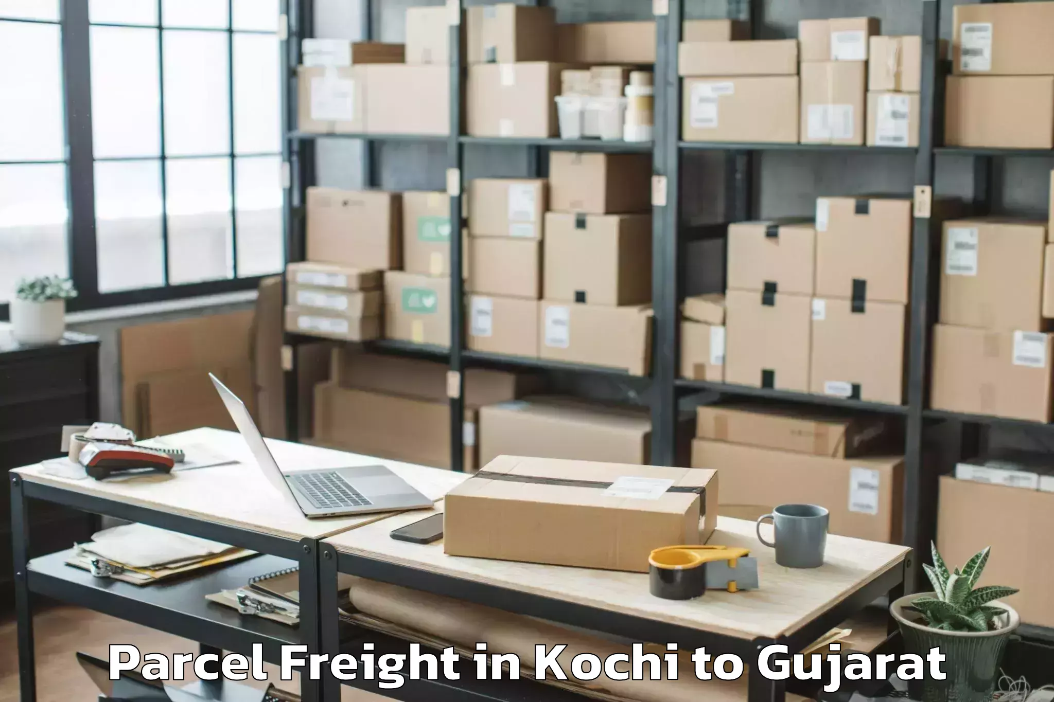 Kochi to Jhulasan Parcel Freight